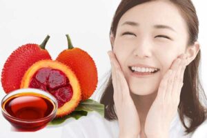 Thoa dầu gấc lên da